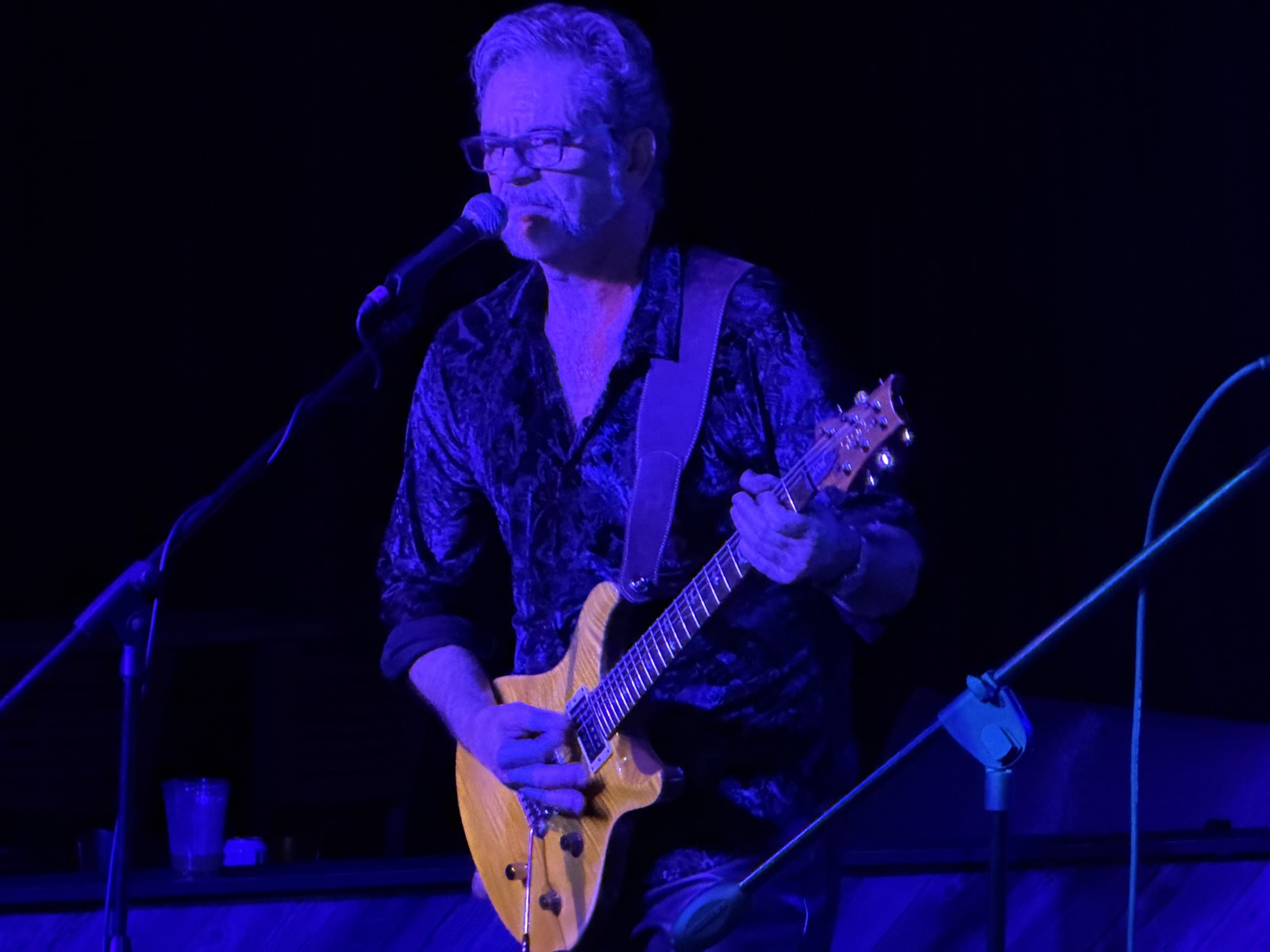 Rik Avalos on stage at Buck's Backyard