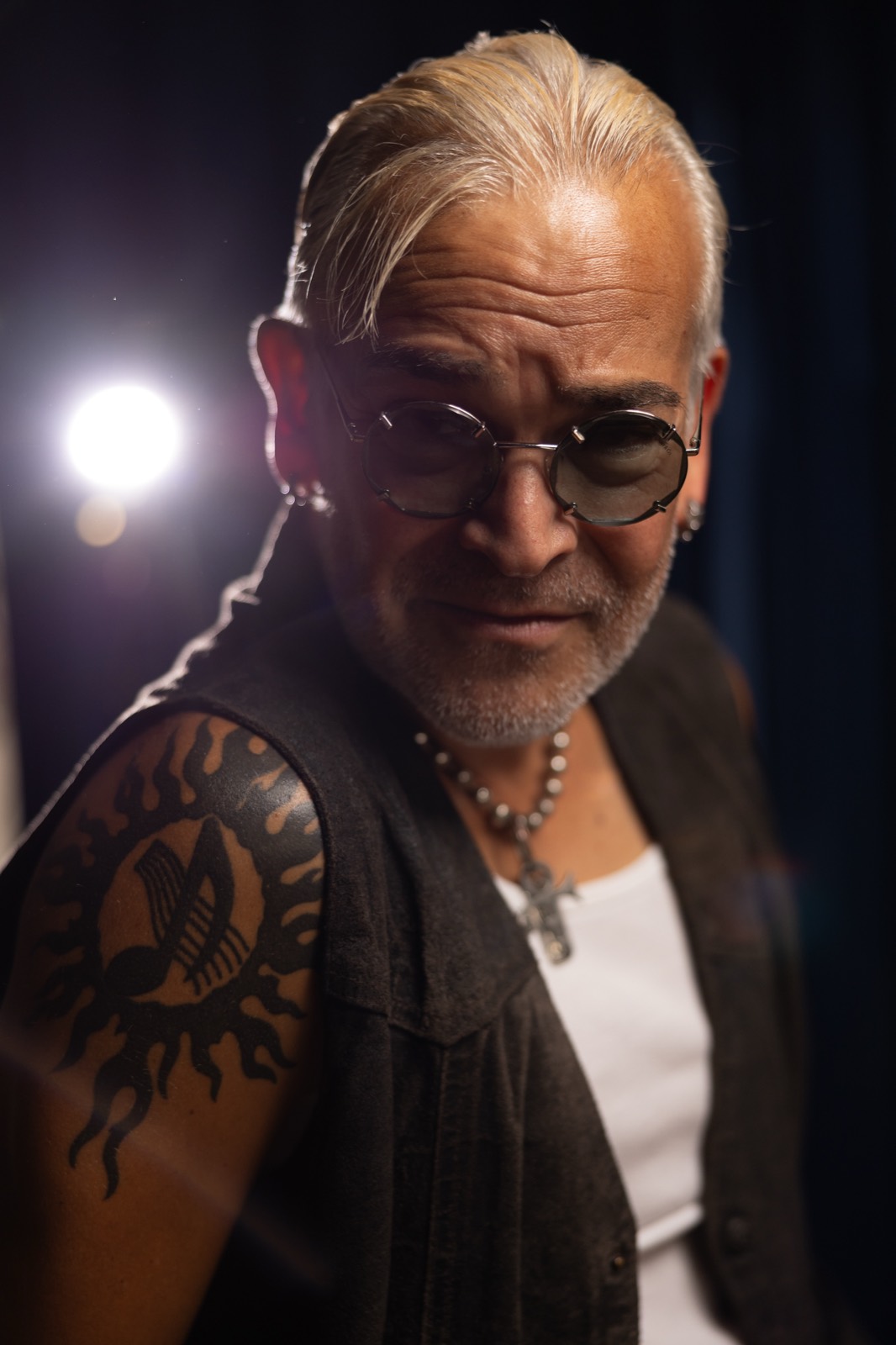 Rik Avalos studio portrait lit by a single stage light